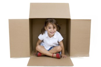 girl-inside-moving-boxes
